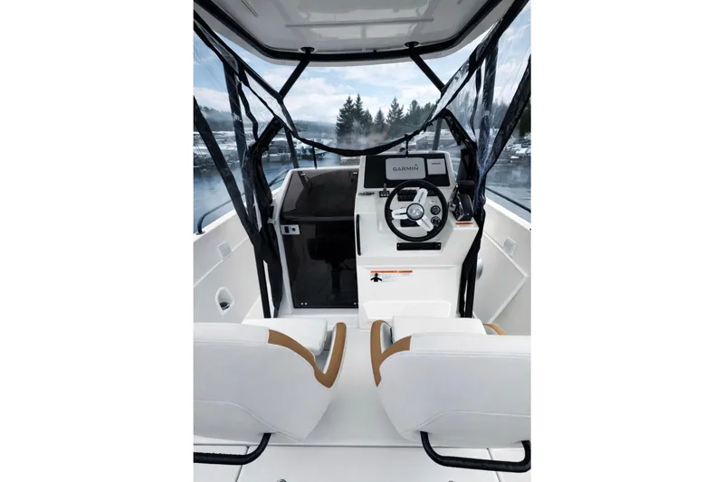 Slide: The Image of 2024 Beneteau Flyer 8 SPACEdeck cockpit with modern steering and navigation system. - 4