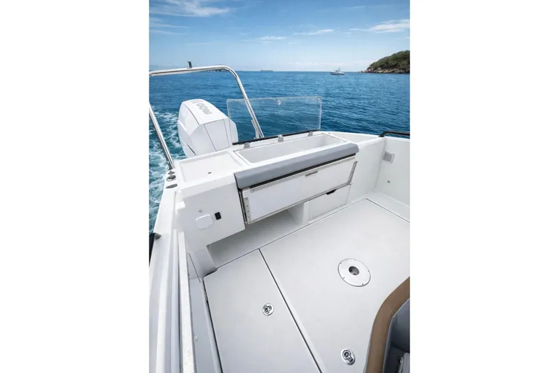 Slide: The Image of 2024 Beneteau Flyer 8 SPACEdeck boat on open water, featuring spacious deck and modern design. - 7
