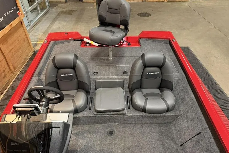Slide: The Image of 2026 Tracker Pro Team 195 Tournament Edition boat interior with three seats. - 11