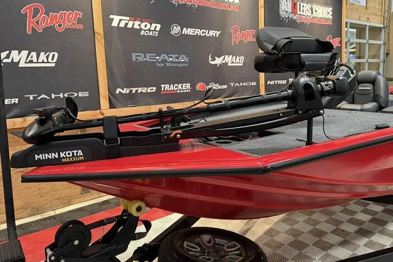 Slide: The Image of Red 2026 Tracker Pro Team 195 Tournament Edition boat with Minn Kota Maxxum motor. - 13