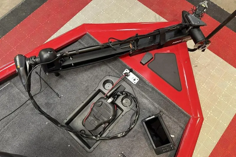 Slide: The Image of 2026 Tracker Pro Team 195 Tournament Edition boat deck with trolling motor and fish finder. - 14