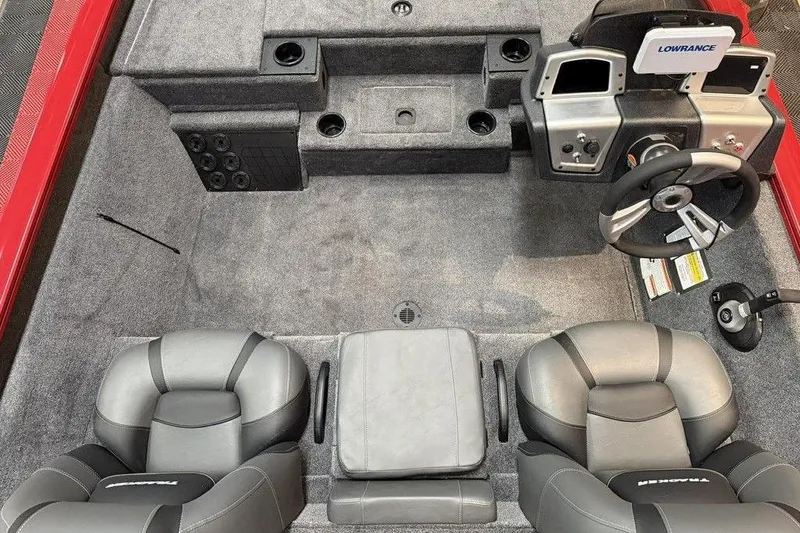Slide: The Image of 2026 Tracker Pro Team 195 Tournament Edition boat interior with steering console and seating. - 7