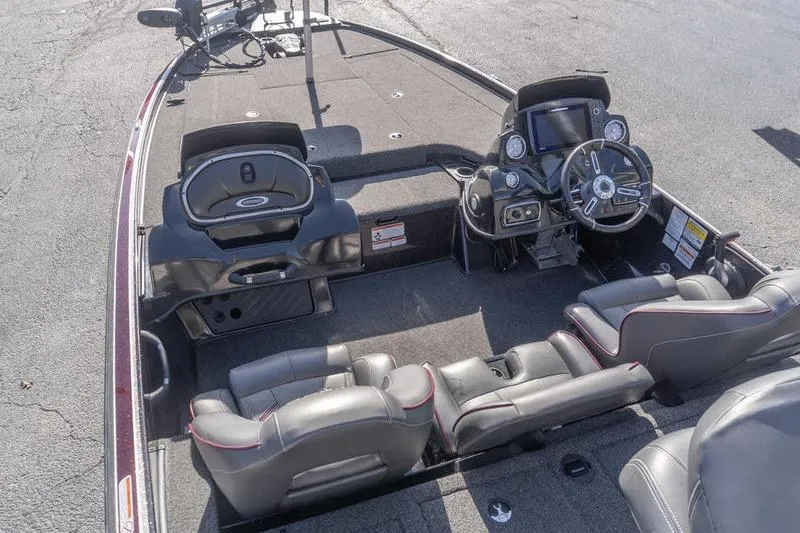 Slide: The Image of 2019 Nitro Z20 Pro fishing boat interior with steering console and seating. - 13