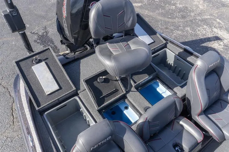 Slide: The Image of 2019 Nitro Z20 Pro boat interior with storage compartments and seating. - 21