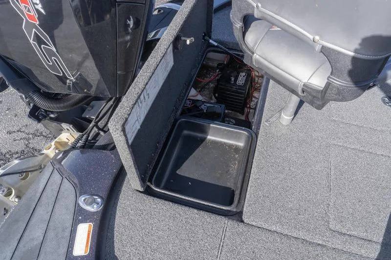 Slide: The Image of Open storage compartment in a 2019 Nitro Z20 Pro boat, showing interior details. - 23