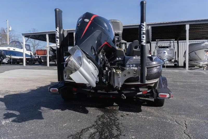 Slide: The Image of Rear view of a 2019 Nitro Z20 Pro boat with powerful outboard motor. - 4