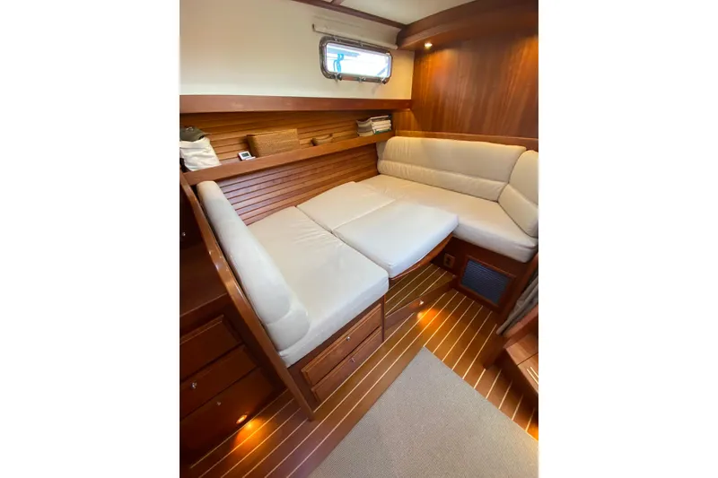 Slide: The Image of Luxurious interior of 2016 Sabre 42 Fly Bridge Sedan with cozy seating and wood accents. - 15