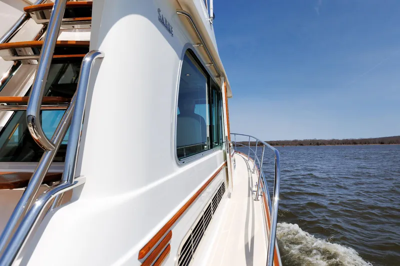 Slide: The Image of 2016 Sabre 42 Fly Bridge Sedan cruising on a sunny day. - 30