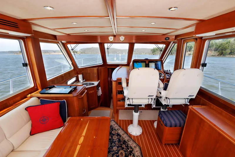 Slide: The Image of Luxurious interior of 2016 Sabre 42 Fly Bridge Sedan yacht with elegant wood finish. - 7
