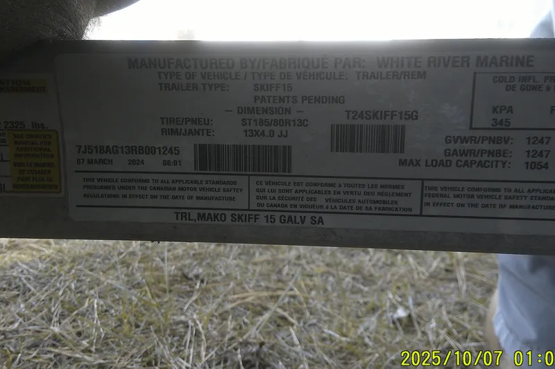 Slide: The Image of Label on a 2024 Mako Pro Skiff 15 CC trailer, detailing specifications and compliance information. - 34