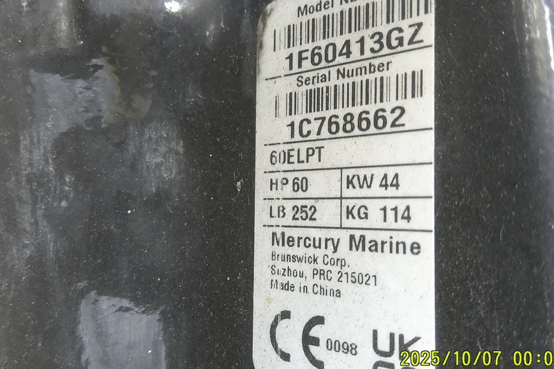 Slide: The Image of Label on Mercury Marine engine, showing model, serial number, and specifications for Mako Pro Skiff 15 CC. - 6