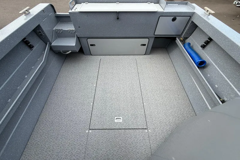 Slide: The Image of Spacious deck of 2026 KingFisher 2025 Escape HTT boat, featuring storage compartments. - 11