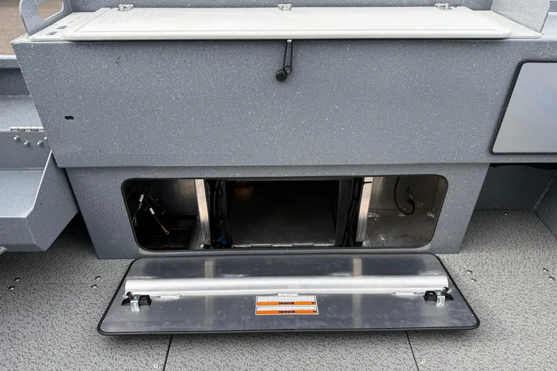 Slide: The Image of Open storage compartment on 2026 KingFisher 2025 Escape HTT boat. - 18