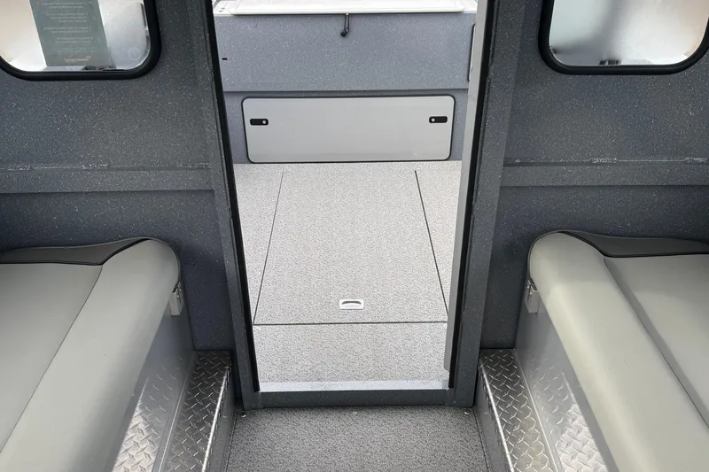 Slide: The Image of Interior view of 2026 KingFisher 2025 Escape HTT boat, featuring seating and storage. - 29