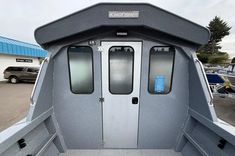 Slide: The Image of KingFisher 2025 Escape HTT boat cabin exterior, showcasing sturdy design and sleek finish. - 8