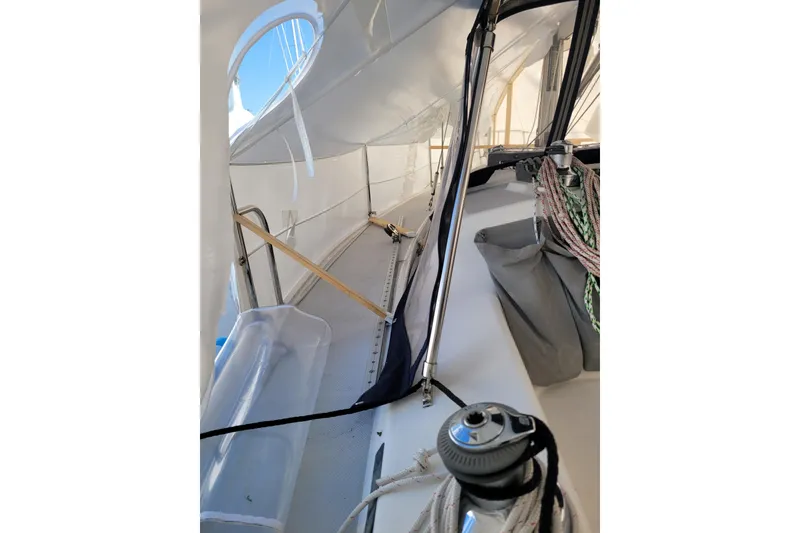 Slide: The Image of 2006 Catalina 320 sailboat deck with rigging and winch details. - 13
