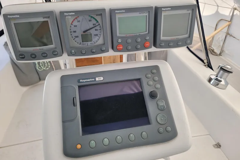 Slide: The Image of Catalina 320 yacht cockpit with Raymarine navigation instruments, 2006 model. - 14