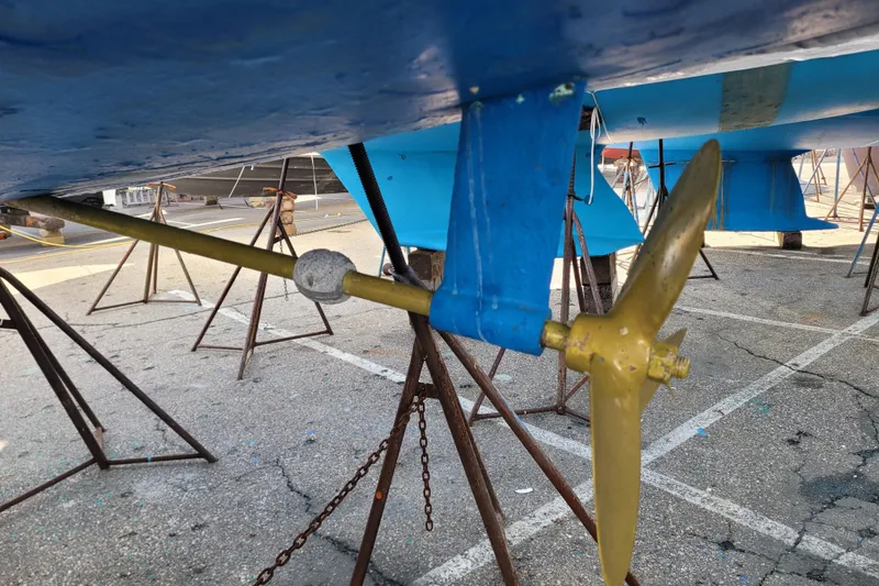 Slide: The Image of Catalina 320 sailboat propeller and shaft, 2006 model, on dry dock. - 35
