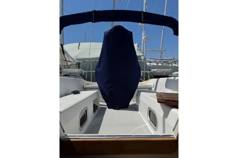 Slide: The Image of Catalina 320 sailboat cockpit view, 2006 model, with covered steering wheel. - 7