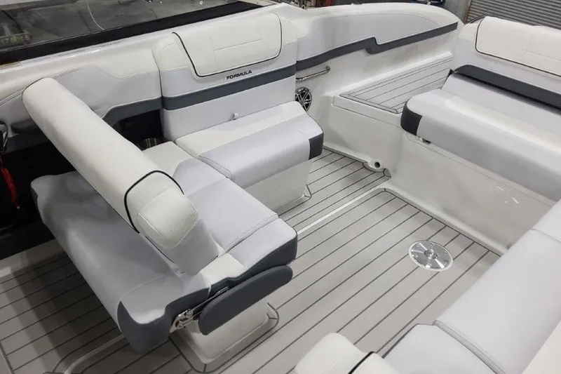 Slide: The Image of 2026 Formula 270 Bowrider interior with sleek white and gray seating. - 11