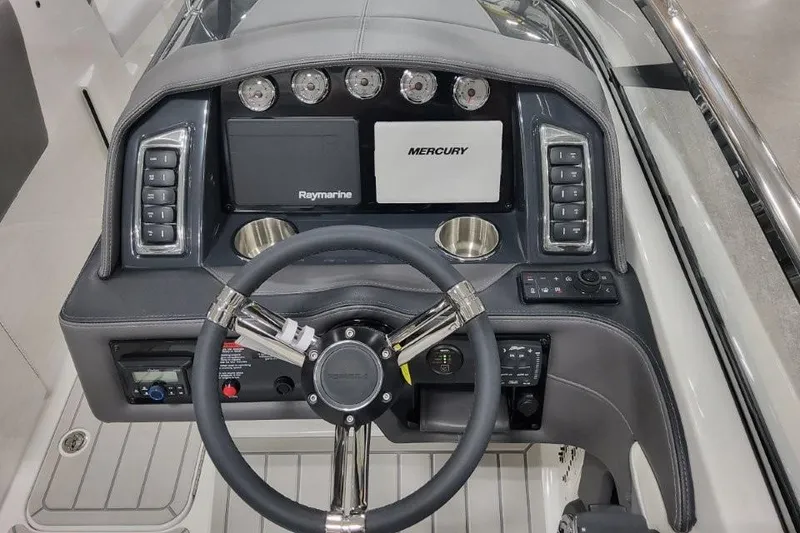 Slide: The Image of Steering console of 2026 Formula 270 Bowrider with Raymarine and Mercury displays. - 14