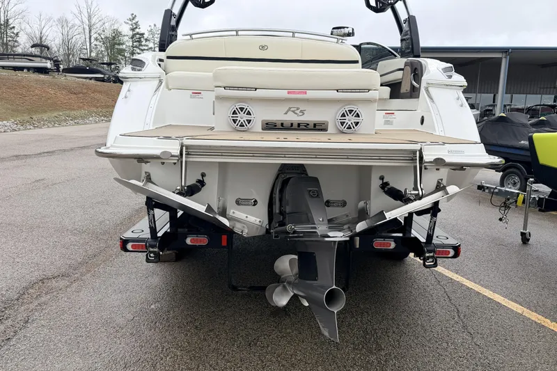 Slide: The Image of 2019 Cobalt R5 Surf boat rear view with propeller and swim platform. - 18