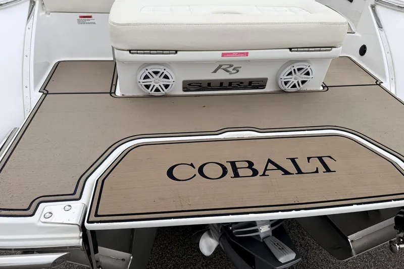 Slide: The Image of 2019 Cobalt R5 Surf boat deck with logo and seating area. - 20