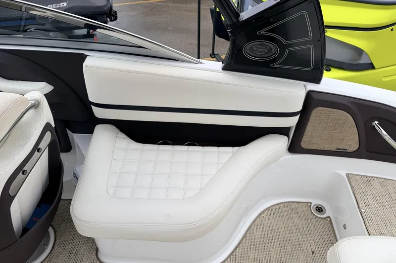 Slide: The Image of Interior of 2019 Cobalt R5 Surf boat with white seating and stylish design. - 23