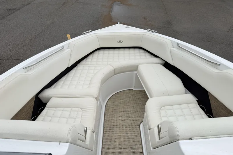 Slide: The Image of Luxurious seating area on a 2019 Cobalt R5 Surf boat with white upholstery. - 30