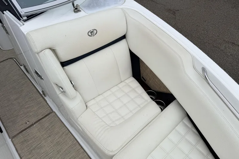 Slide: The Image of 2019 Cobalt R5 Surf boat with luxurious white leather seating. - 31