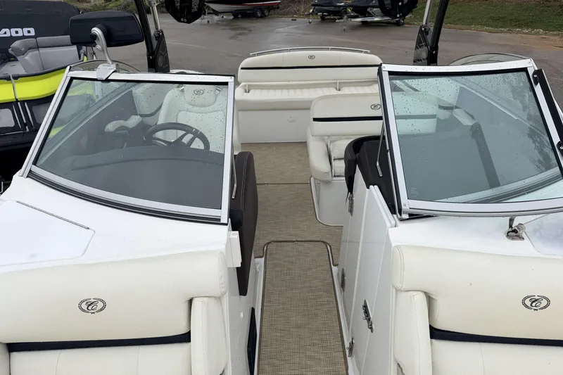 Slide: The Image of 2019 Cobalt R5 Surf boat interior with white seating and dual windshields. - 33