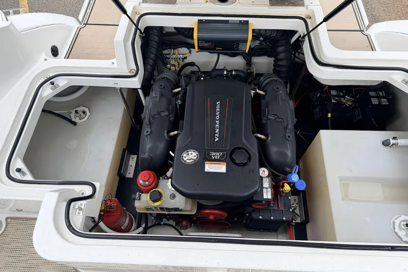Slide: The Image of Engine compartment of a 2019 Cobalt R5 Surf boat featuring a Volvo Penta 380 V8 engine. - 36
