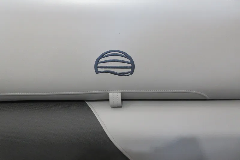 Slide: The Image of 2026 Sun Tracker Party Barge 20 DLX seat with embroidered logo detail. - 9