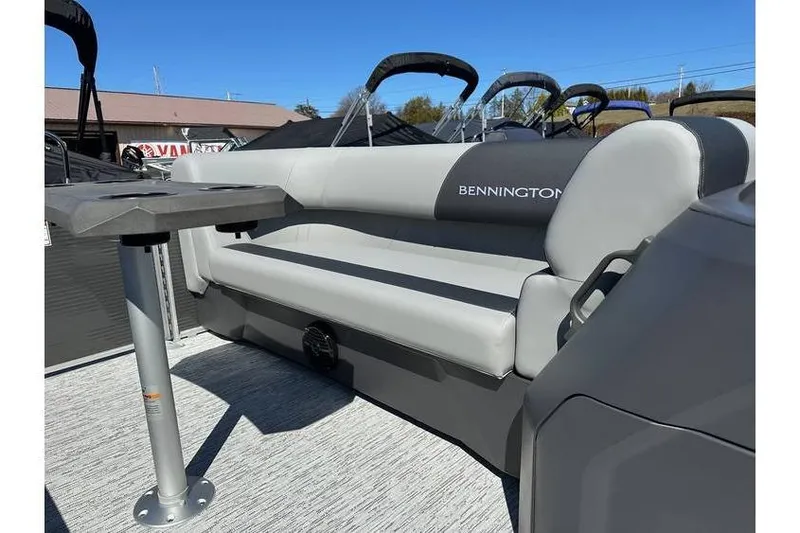 Slide: The Image of 2026 Bennington 20 SSR Quad Bench boat interior with Yamaha 90Hp engine, featuring sleek seating. - 13