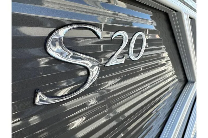 Slide: The Image of Close-up of Bennington 20 SSR Quad Bench boat emblem, 2026 model. - 19