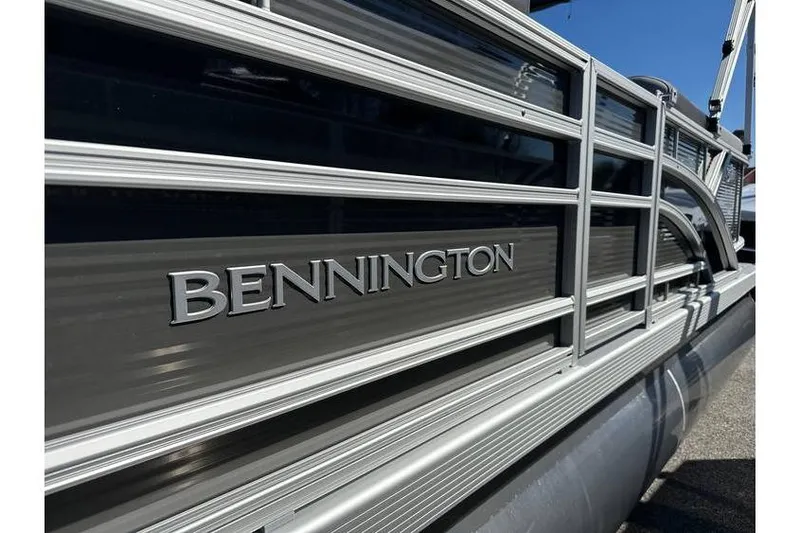 Slide: The Image of 2026 Bennington 20 SSR Quad Bench pontoon boat with Yamaha 90Hp engine, side view. - 4