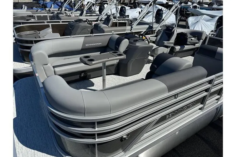 Slide: The Image of 2026 Bennington 20 SSR Quad Bench pontoon boat with Yamaha 90Hp engine, gray seating. - 5