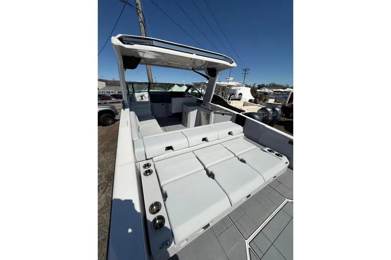 Slide: The Image of 2023 Aviara AV32 I/O boat with spacious seating and modern design. - 5