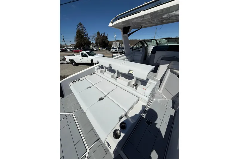 Slide: The Image of 2023 Aviara AV32 I/O boat with luxurious seating and sleek design. - 6