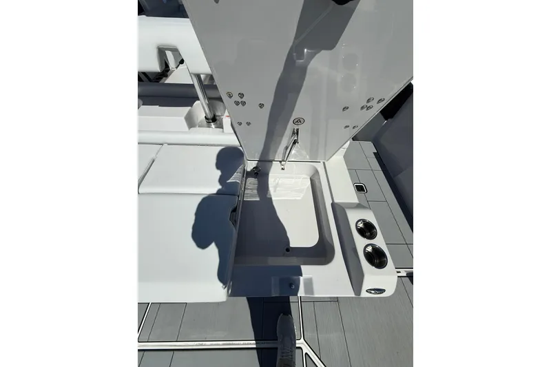 Slide: The Image of 2023 Aviara AV32 I/O boat interior with sleek white design and modern fixtures. - 7
