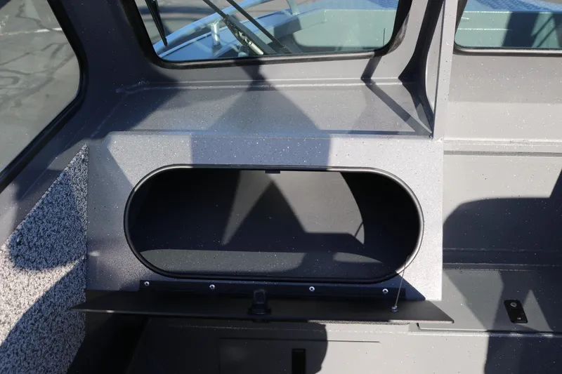 Slide: The Image of 2026 Alumaweld Stryker 220 boat interior storage compartment detail. - 14