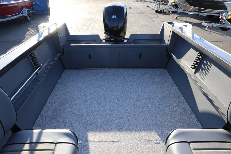 Slide: The Image of 2026 Alumaweld Stryker 220 boat interior with spacious deck and seating. - 33