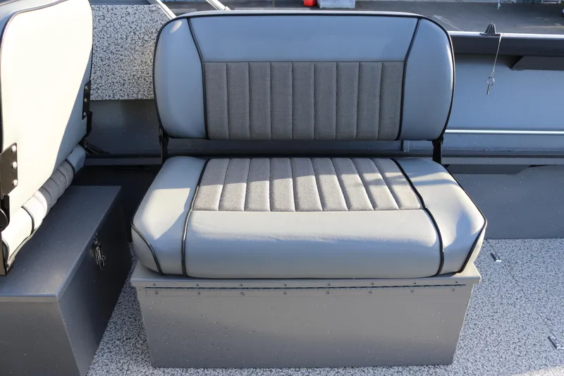 Slide: The Image of 2026 Alumaweld Stryker 220 boat seat with gray upholstery and storage compartment. - 36