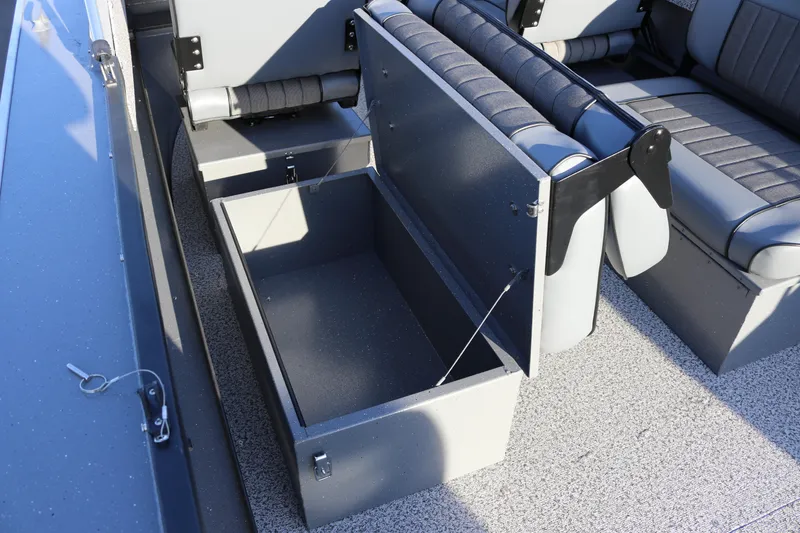 Slide: The Image of Open storage compartment in 2026 Alumaweld Stryker 220 boat interior. - 40
