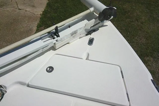 Slide: The Image of 2005 Century 2201 Bay Boat deck with storage compartment and trolling motor. - 13