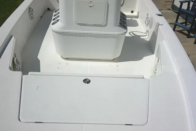 Slide: The Image of 2005 Century 2201 Bay Boat interior, featuring a clean, spacious deck layout. - 14