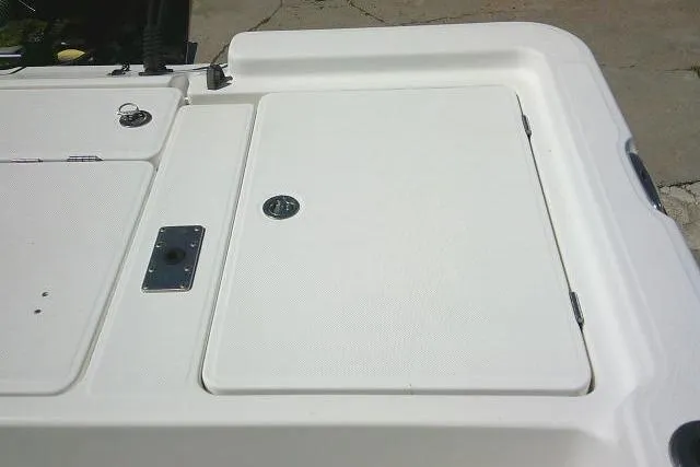 Slide: The Image of 2005 Century 2201 Bay Boat deck with storage compartments. - 20