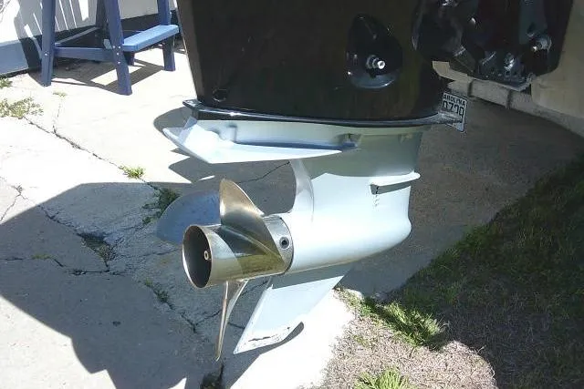 Slide: The Image of Outboard motor of a 2005 Century 2201 Bay Boat on a concrete surface. - 5