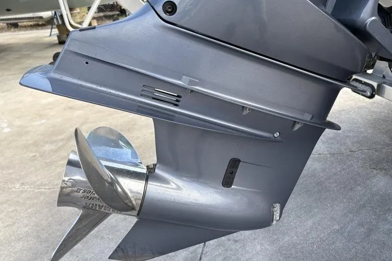 Slide: The Image of Close-up of a 2020 Islamorada 24 Morada boat's outboard motor and propeller. - 4