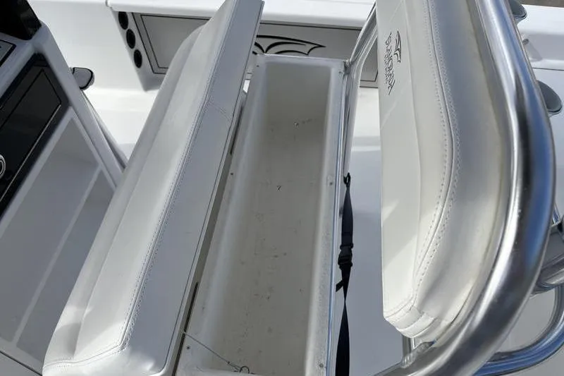 Slide: The Image of 2020 Islamorada 24 Morada boat seating with storage compartment. - 12